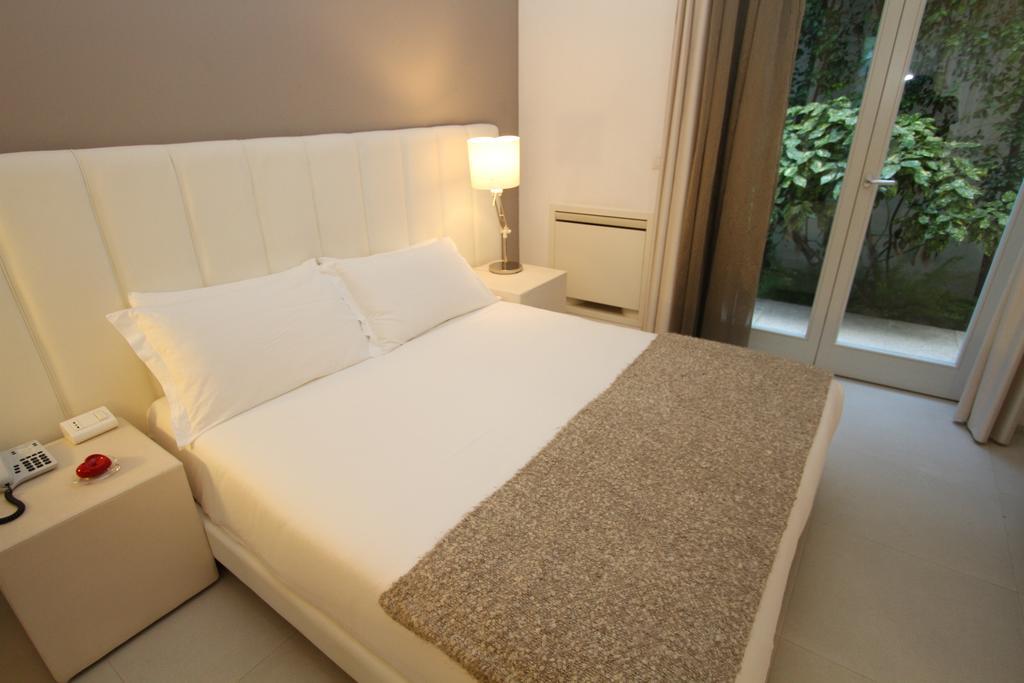 Soglow Business Class Hotel Мольфетта Номер фото